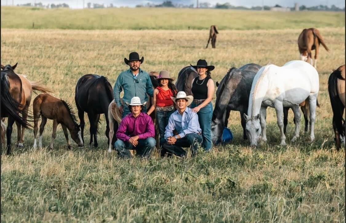 The Valles family with their horses